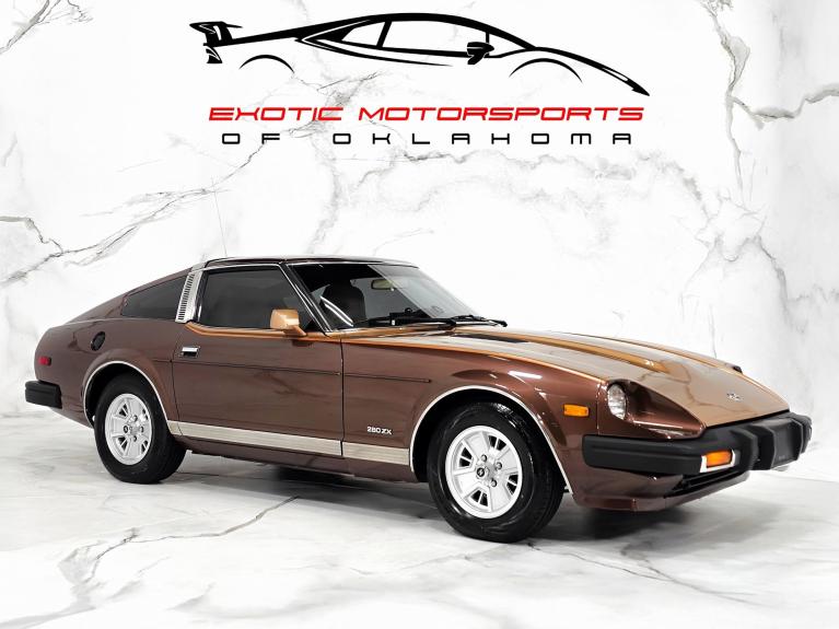 Used 1979 Datsun 280ZX ORIGINAL SPARE TIRE JACK AND WHEEL CHOCKS